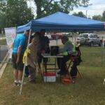 Welcome tent with visitors W9DXR Photo